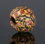 Ancient Roman glass bead with checkerboard pattern